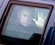 [ George W. Bush looking out of his limousine :: How's the Florida vote counting going? ]