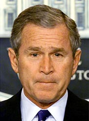 [ George W. Bush looking frustrated. More... ]