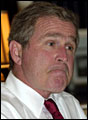 [ George W. Bush looking displeased. More... ]